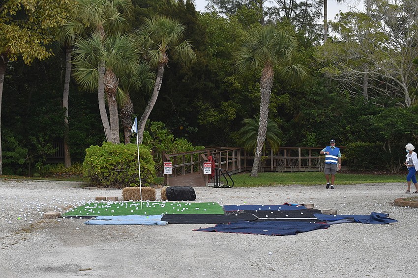 Judges checked who won the helicopter ball drop.