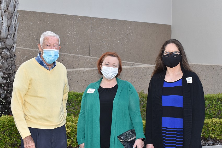 Jerry Fox with Turning Points executive director Kathleen Cramer and director of development Margi Dawson.