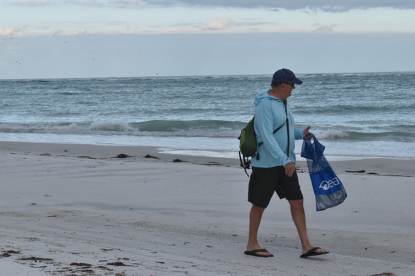 Brian Maddox keeps his eyes on the sand.