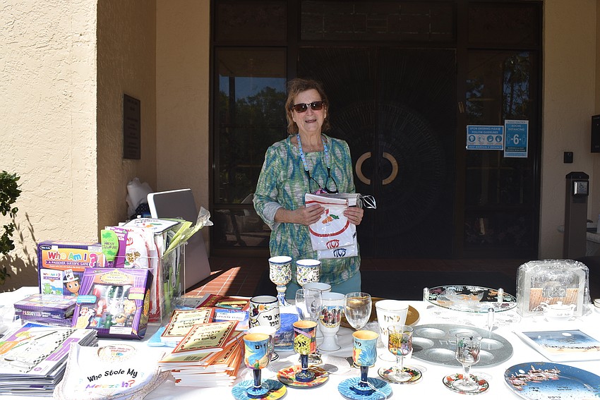 Tena Tessler at the gift shop table.