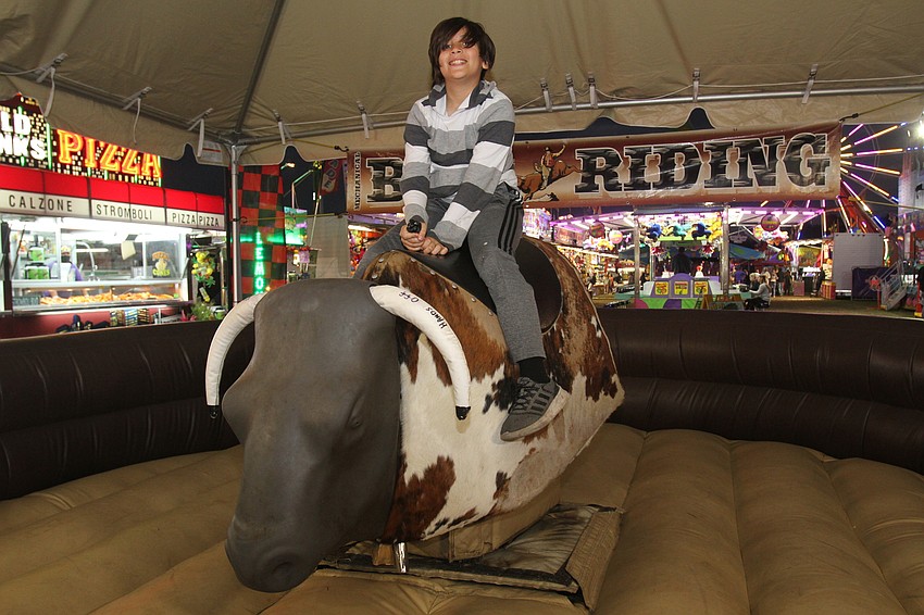 Kas Orduno tried out the mechanical bull.
