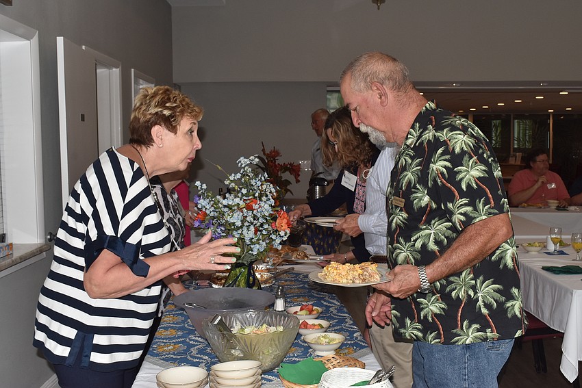 Sparky and Karen Pashkow serve up breakfast.
