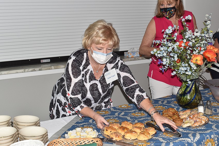 Jamie Engel sets out her homemade scones.
