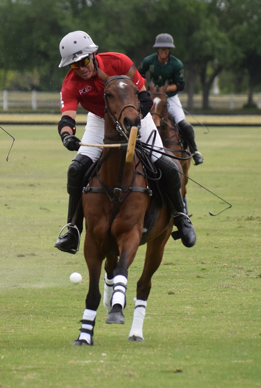 James Miller takes a shot on goal for Hillcroft Farm.