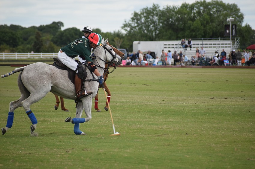 Glen Farm's Stuart Campbell sends a pass down the field.