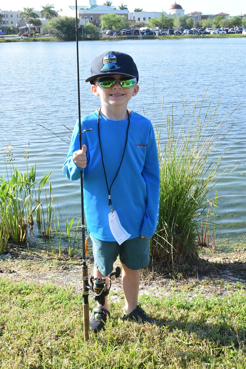 Orlando's Parker Ramos visits his grandfather, Joe Pfeiffer, who lives in Esplanade, every year to participate in the Youth Fishing Tournament.