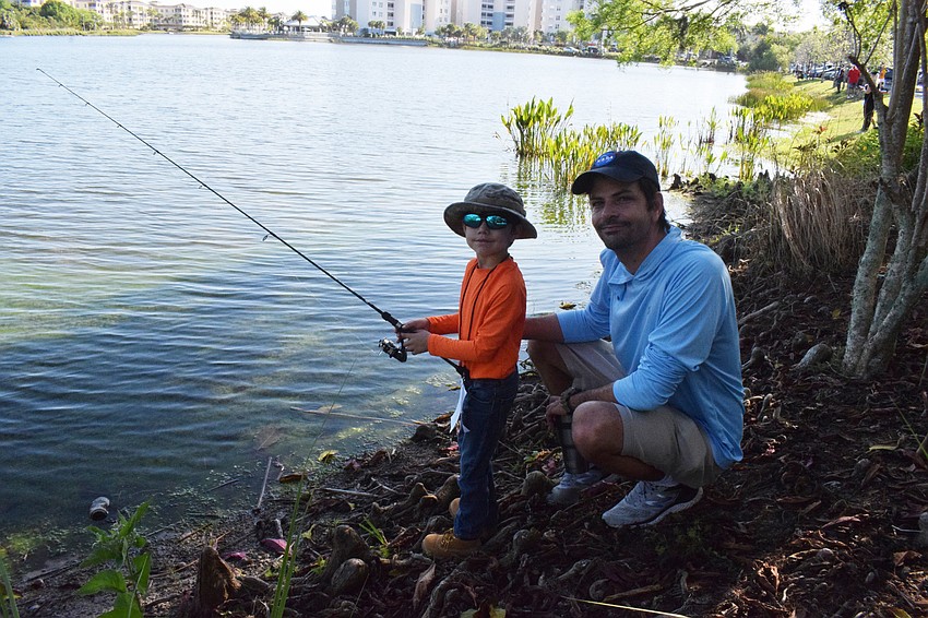 Sarasota's Alex Nadal, who is 7, and his father, Roberto Nadal, participate in the Youth Fishing Tournament for the first time.