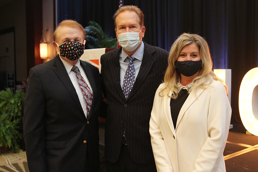 Dr. Larry Thompson, Congressman Vern Buchanan and Chamber President and CEO Heather Kasten