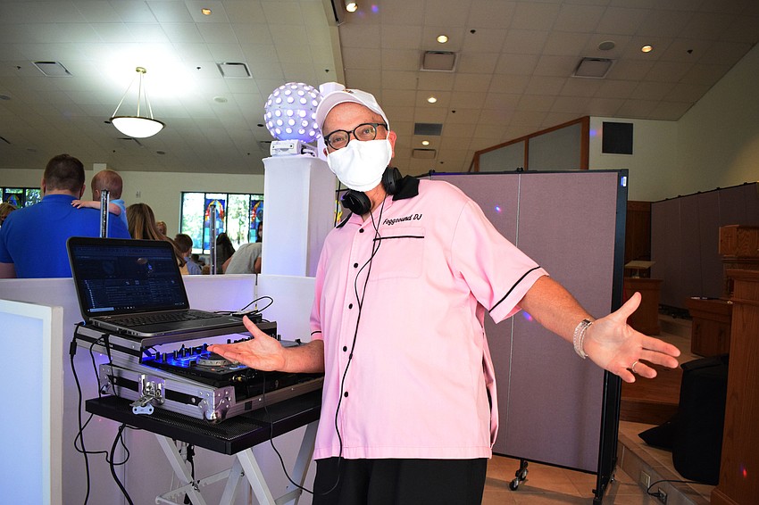 John Finnegan, a member of the Knights of Columbus, provides music for the Easter Egg Hunt.