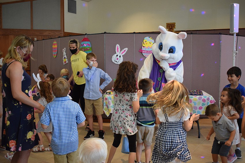 Children dance with the Easter bunny. Greenbrook's Christine Castellon says seeing her 2-year-old son Mateo dancing with the Easter bunny was her favorite part of the event.