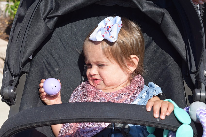 Lakewood Ranch's Scarlett Baron holds onto an egg that holds a raffle ticket inside.