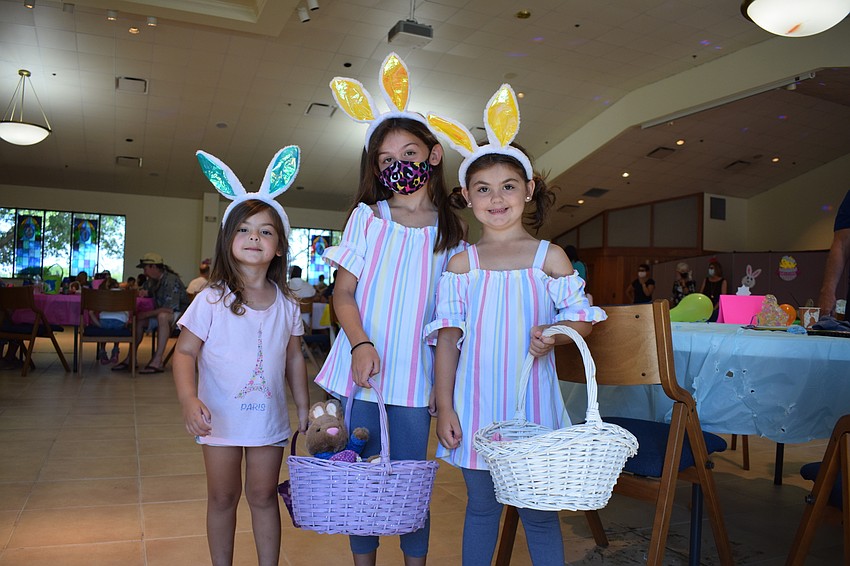 Greenbrook's Hazel McSherry, who is 2, enjoy the prizes she and her 6-year-old sister Scarlett and 5-year-old sister Kenna won during the raffle.