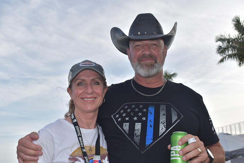 Sarasota resident Monica Serino and Sarasota High School Wrestling Coach Brent Yoder came to My Hometown Jam to support their friend, who is a member of the Michael J. Weiss Trio.