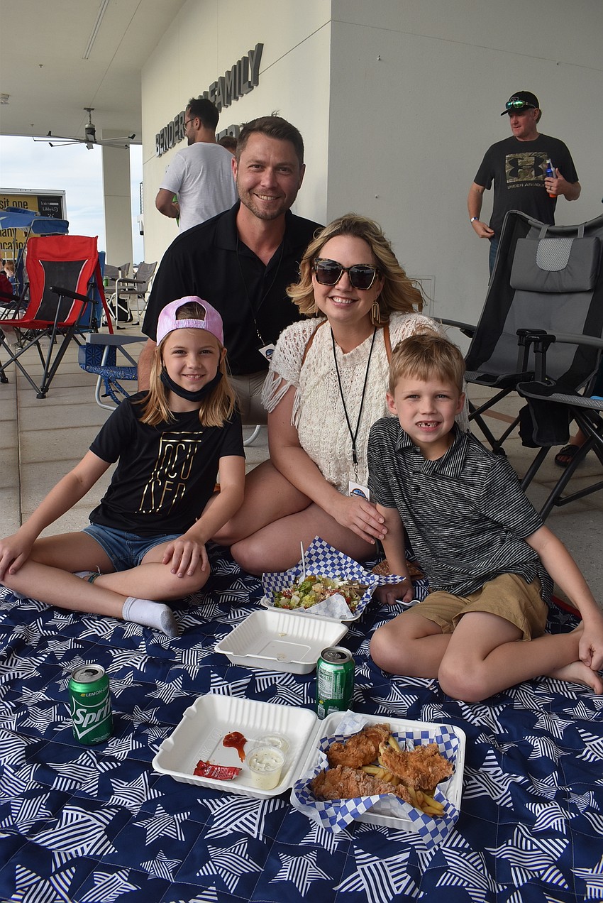 St. Petersburg residents Brie Burgess, 9, Chad Burgess, Brittany Burgess and Beau Burgess, 7, were invited to My Hometown Jam by their cousins. They hoped to see Tim Reynolds play 