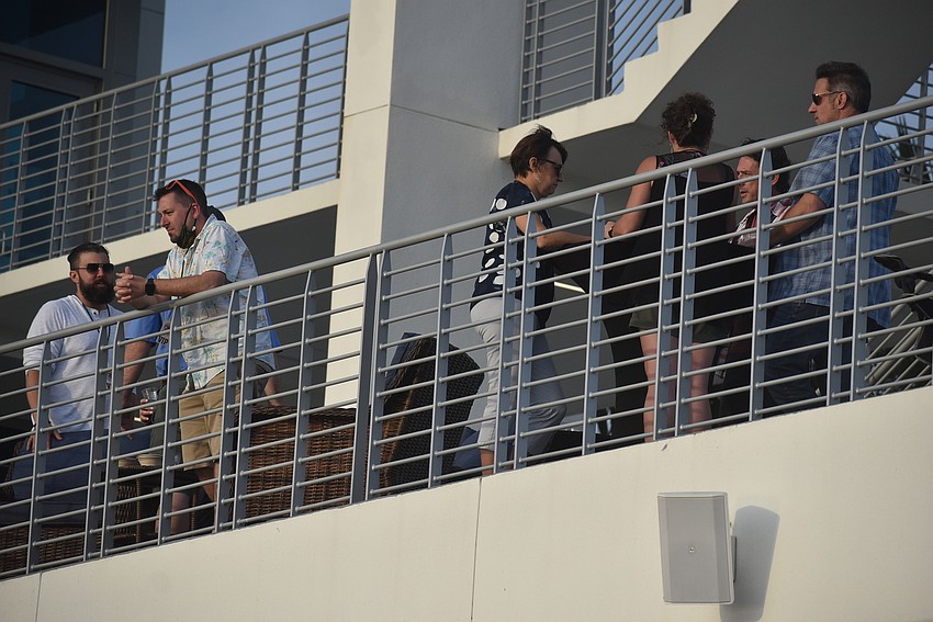 Concertgoers watch My Hometown Jam from the VIP deck at Nathan Benderson Park's Finish Tower. The concert featured performances from The Derek Lersch Band, Micheal J. Weiss Trio, Marcel, Unspoken, Intelectualz and Kurses & Karma.