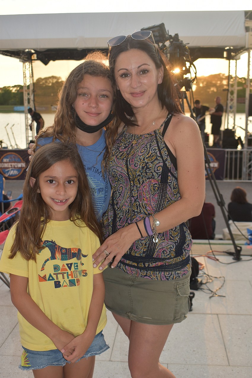 Del Tierra residents Aine Jensen, 6, Grace Jensen, 10, and Rita Jensen came to My Hometown Jam to see Tim Reynolds. Rita Jensen said her favorite song has been 