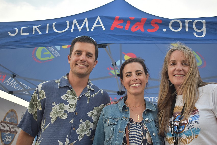 Sarasota residents Peter and Nina Eduardo stand with Pam Plank, who is the executive director and a therapist at Sertoma Club of Greater Sarasota. 