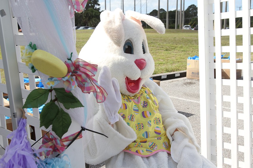 The Easter Bunny delivers gifts to families at the end.