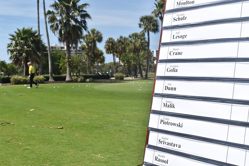 Others took to the putting green to practice their short games.