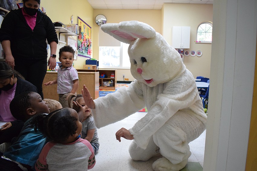 The Easter bunny visits one of the classrooms at Kiddie Academy of Lakewood Ranch. The children were excited to see the Easter bunny and wanted to give hugs and high-fives.