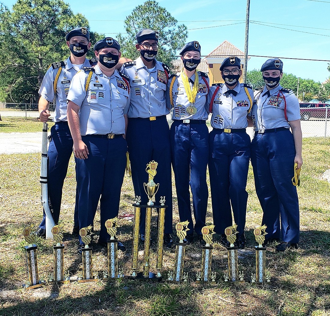 Members of the Braden River High School Pirate Battalion Drill Team celebrate winning their fifth district championship in a row. The team will now move onto state. Courtesy photo.