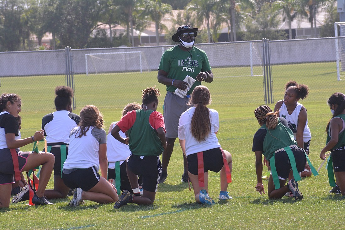 Elijah Weaver talks to his team after an April 1 practice. Weaver said his hope is for flag football to be taken as seriously as other sports at Lakewood Ranch.