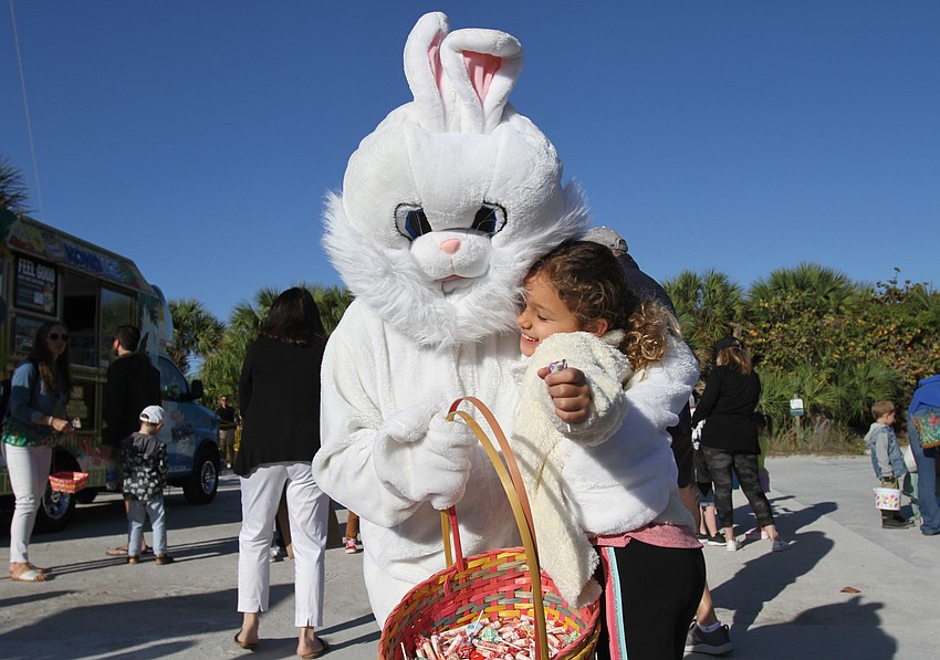 Taylor Bouyet embraces the Easter Bunny.