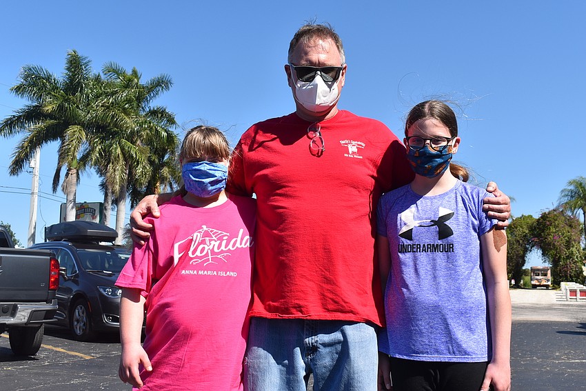 Hannah Zoschke, 11, Rob Zoschke, and Amelia Hoschke, 11, are visiting from Wisconsin to see their grandparents. Hannah and Amelia are twins who enjoyed bungee jumping the most of any activity.
