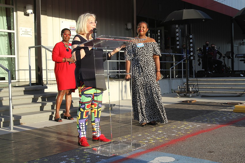 Co-chairwoman Marian Moss spoke to the group.