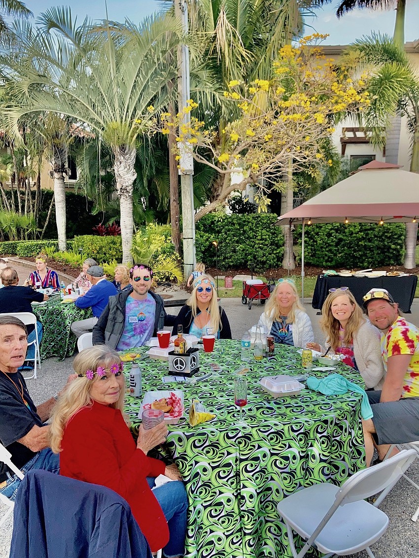 Groups mingle at tables. Courtesy photo.