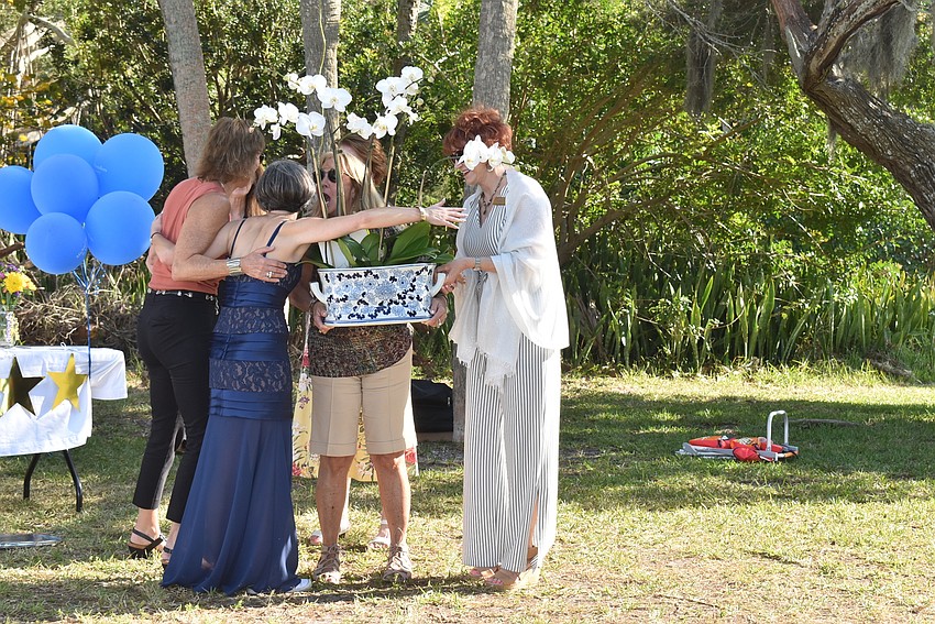 Sharon Gould accepted a surprise award from her team.