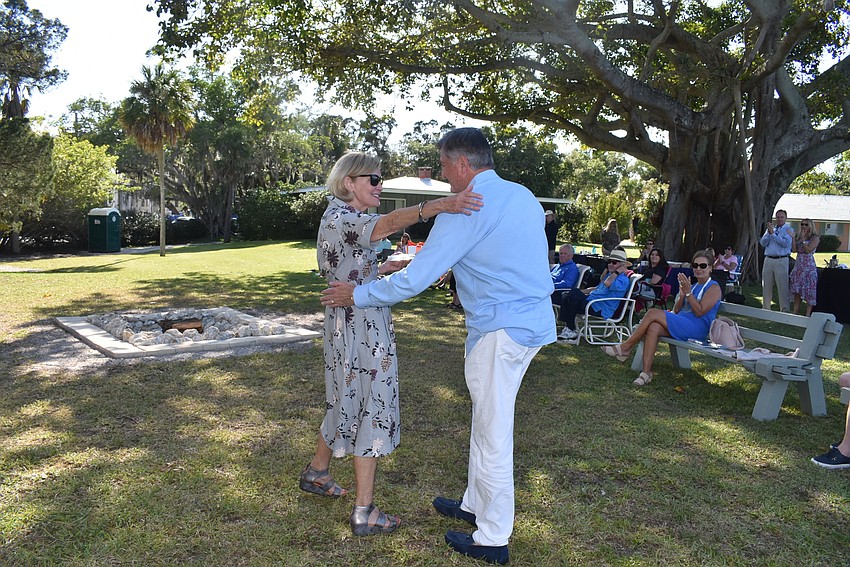 Georgina Clamage hugs Michael Moulton.