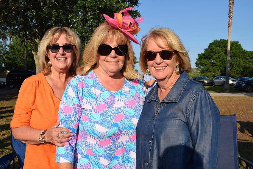Venice's Deb Marchetta, Patti Thole and Rebecca Townsend have fun watching the polo match. They had never been to the Sarasota Polo Club before Sunset Polo. 