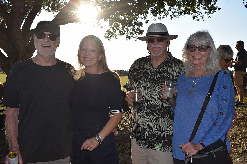Lakewood Ranch's Greg Kemp and Annie Kemp and Lakewood Ranch's Earl Robertson and Candy Robertson loves listening to the commentary during the polo match.