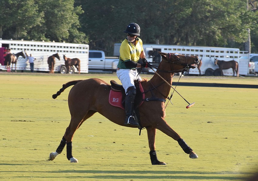 Whiskey Pond's Raymond Guest makes his way down the field.