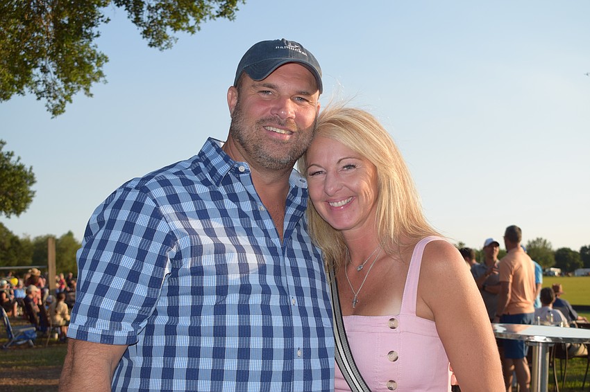 Lakewood Ranch's Ken Yermak and Rebecca Marek enjoy their first Sunset Polo. Yermak says his favorite part of the night was stomping out divots.