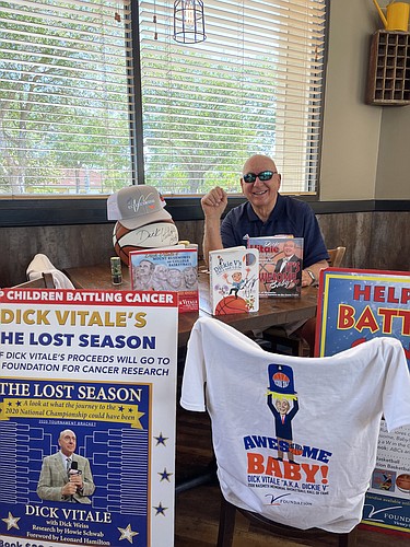 Dick Vitale sits at his usual table at First Watch in Lakewood Ranch. Vitale said fans are welcome to say hello and purchase merchandise from him. He&#39;s typically there around noon each weekday. Courtesy photo.