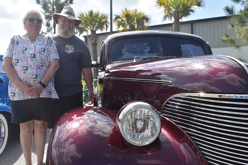 Parrish residents Bonnie and Bill Schnatter stand by their 1939 Chevy Business Coup, which Bill Schnatter said was a working man's car. It doesn't have a backseat, which provided more room for business supplies.