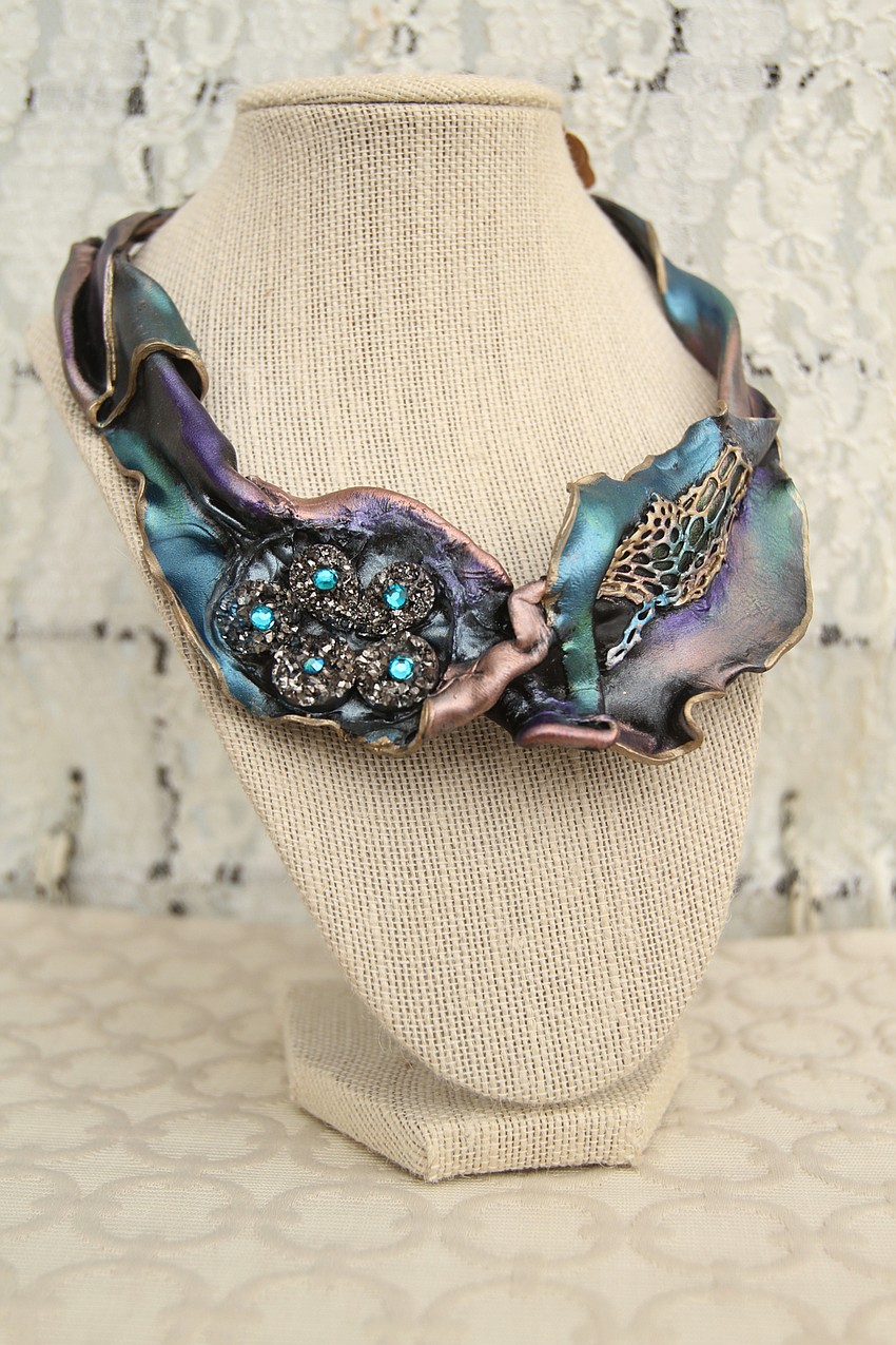 Jean Houndsone had acrylic soft wrist cuffs and necklaces