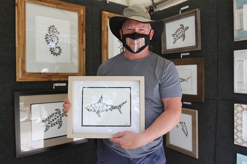 Kevin Kennedy made mosaic art out of shark teeth, which he finds on Manasota Key.