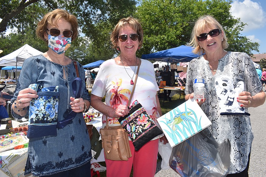 Lakewood Ranch residents and Our Lady of the Angels parishioners Carol Lafortune, Joan Jones and Mary Balazic purchased paintings, jewelry, soap made from goat's milk, lavender and milk.