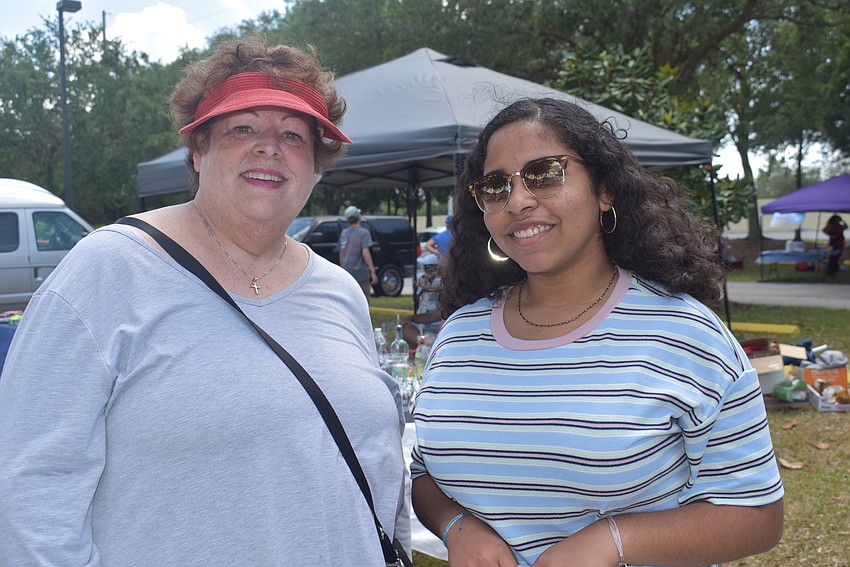 Bradenton residents Maryanne Kelly and Nina Murray enjoy the craft show at Our Lady of the Angels, where Murray's mother is the business manager. Kelly was most excited to shop outside, while Murray wanted to see artwork.