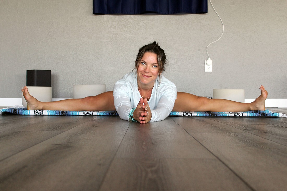 Jillian Walker, who has been practicing yoga since 14, helped open a yoga studio in Siesta Key Village.