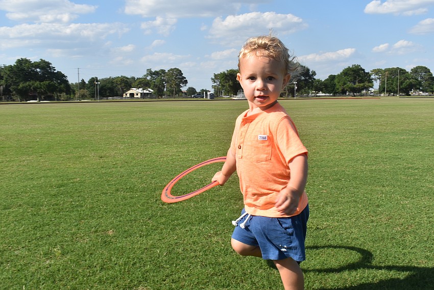 Lakewood Ranch resident Liam Chana is almost 2 years old. He enjoyed running around and throwing a Frisbee.