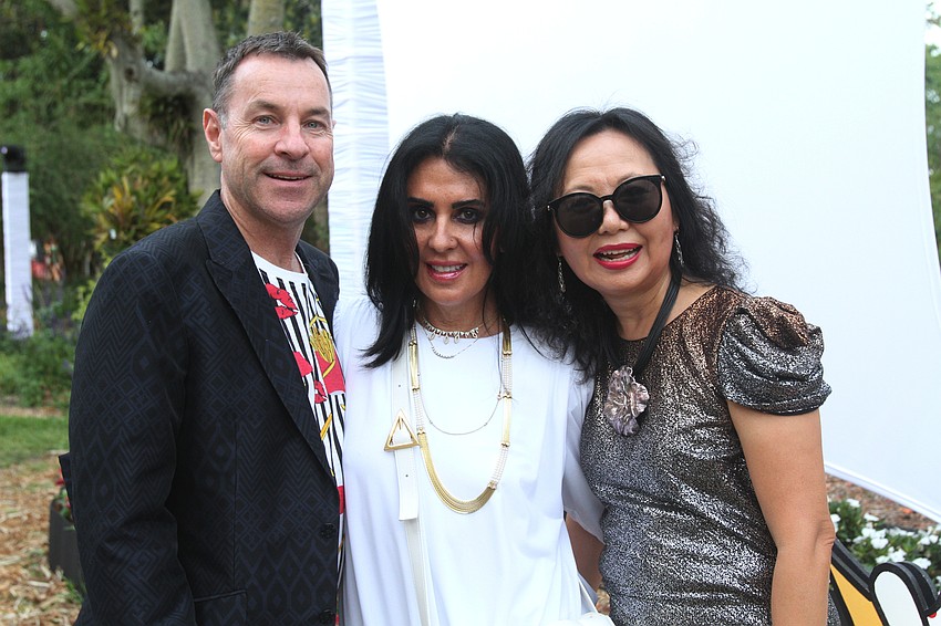 Jerry and Lisa Wells with Kathy Yu