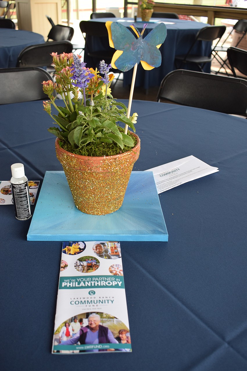 The table centerpieces are made by students at Selby Preschool & Haven Academy.