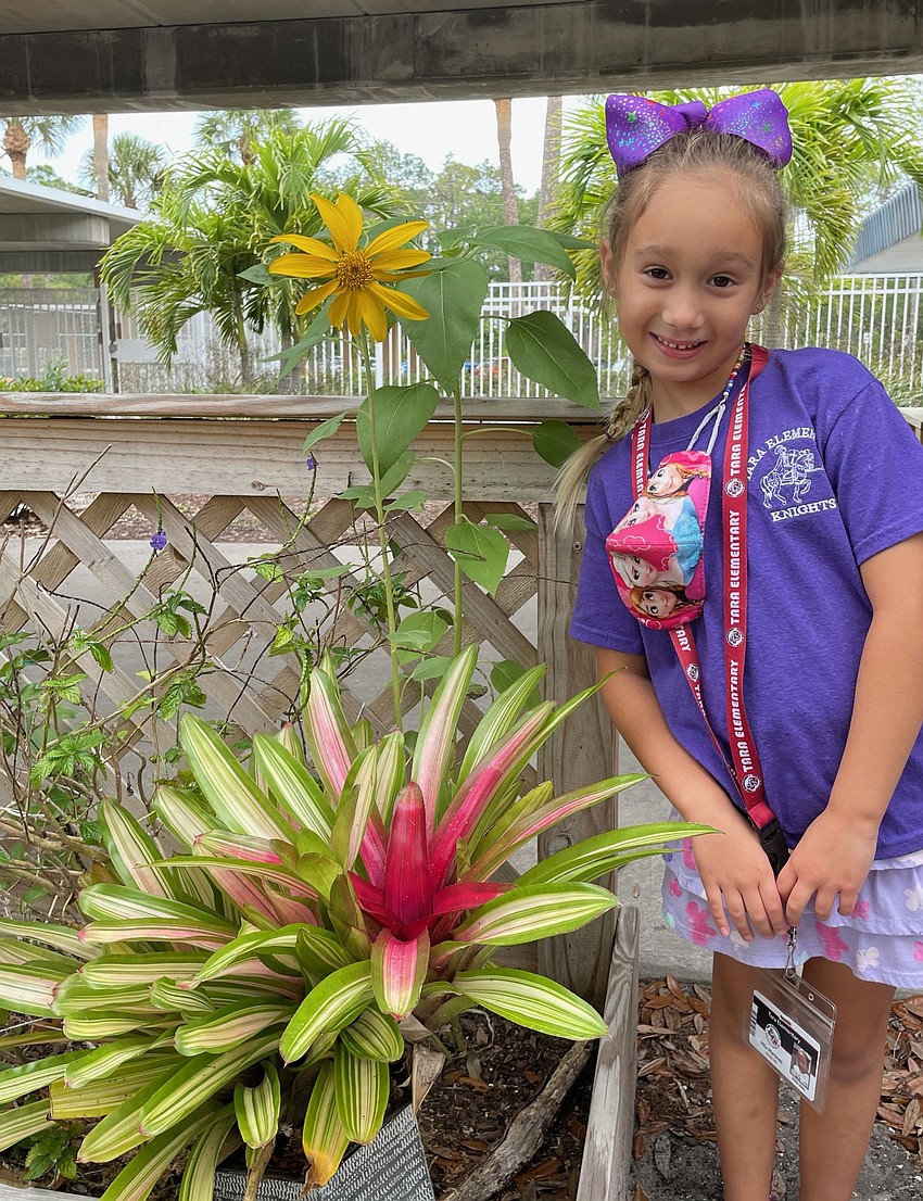 Mila Martinez, a kindergartner at Tara Elementary School, spends time in the garden. The garden is an opportunity for students to learn how to plant fruits and vegetables and develop healthy eating habits. Courtesy photo.