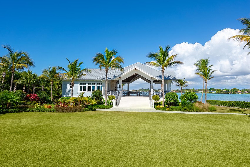 A 2,300 square foot guest house offers an outdoor entertaining area of its own.