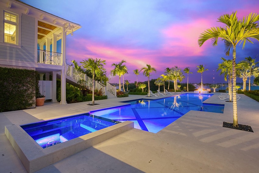 The home is situated on a section of Casey Key with views of both the Gulf of Mexico and Blackburn Bay.