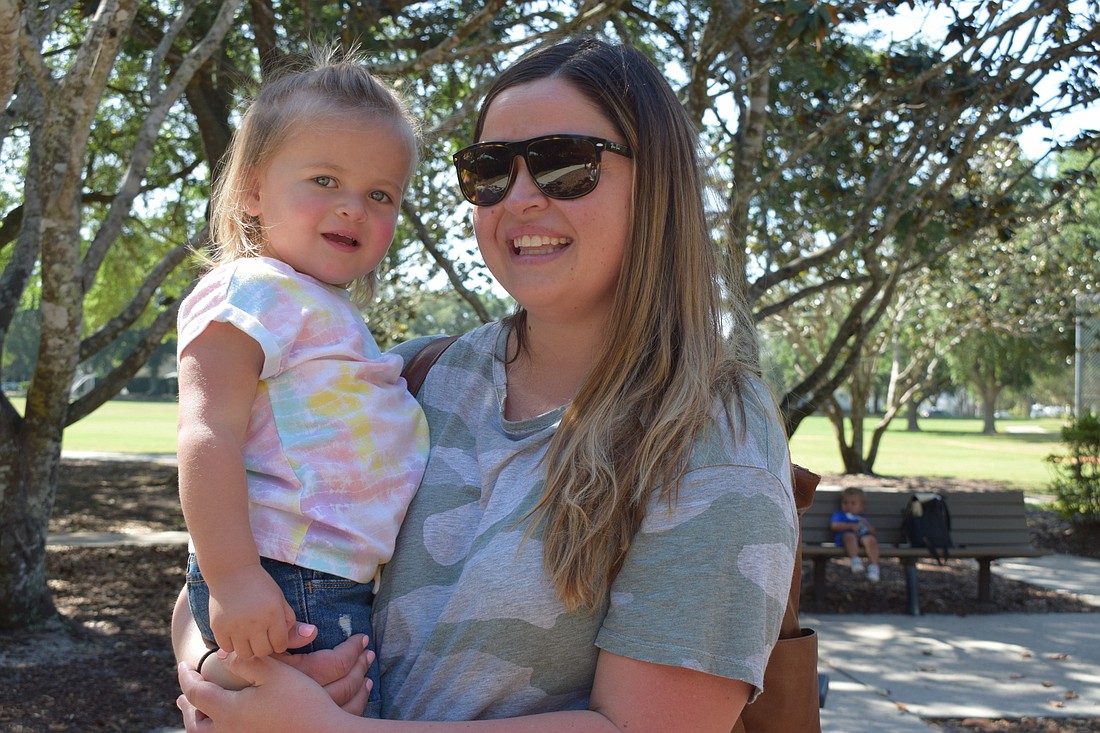 Lakewood Ranch&#39;s Mackenzie Loukota, who is 21 months old, and her mother, Vicki Loukota, play at the park together.